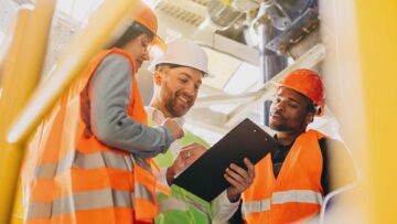 One Compliance Office Discussing ISO 45001 Implementation Plans with Safety Workforce