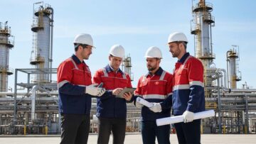 4 Occupational Health and Safety Professionals standing at oil and gas refinery